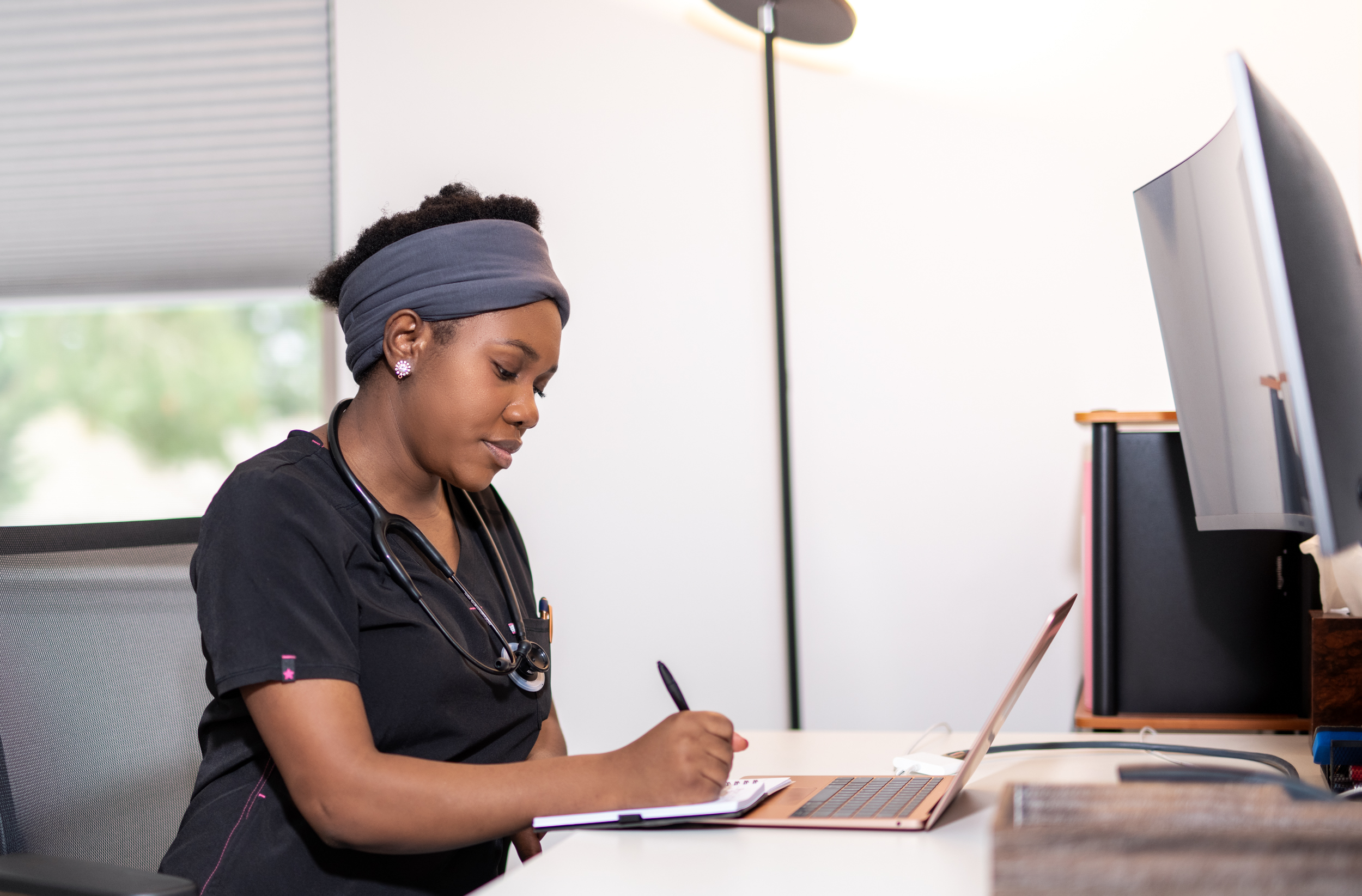 Caregiver providing compassionate care to senior resident