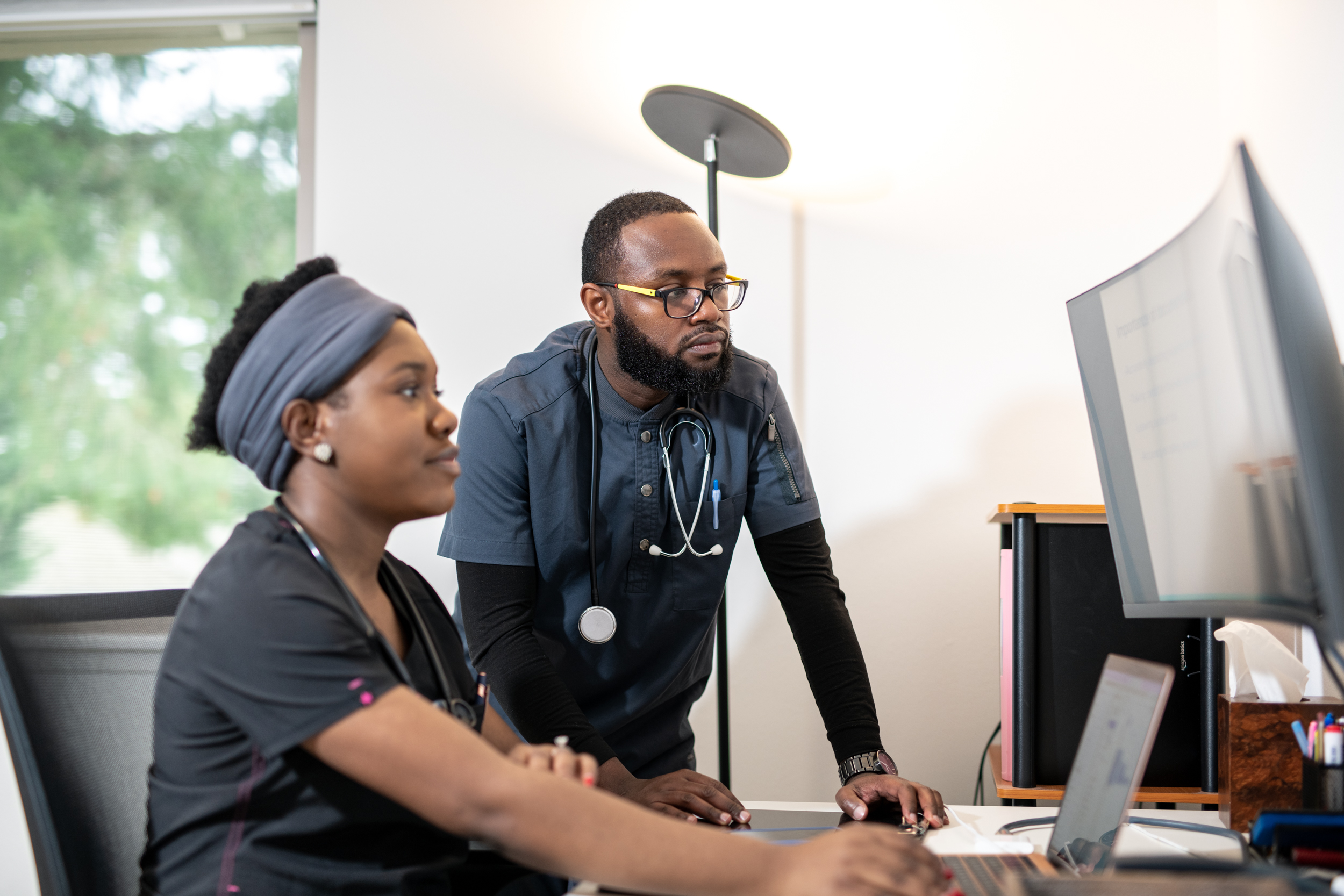 Caregiver and senior woman smiling - personalized home care