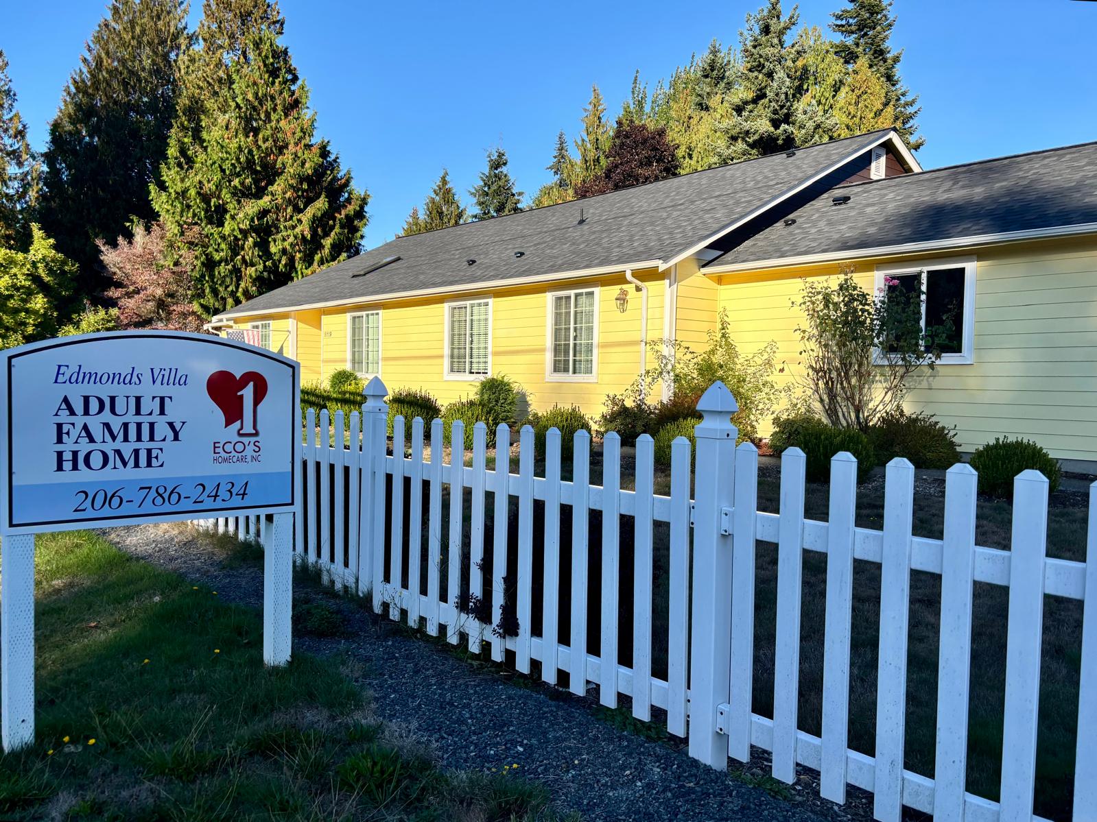 Edmonds Villa exterior with picket fence